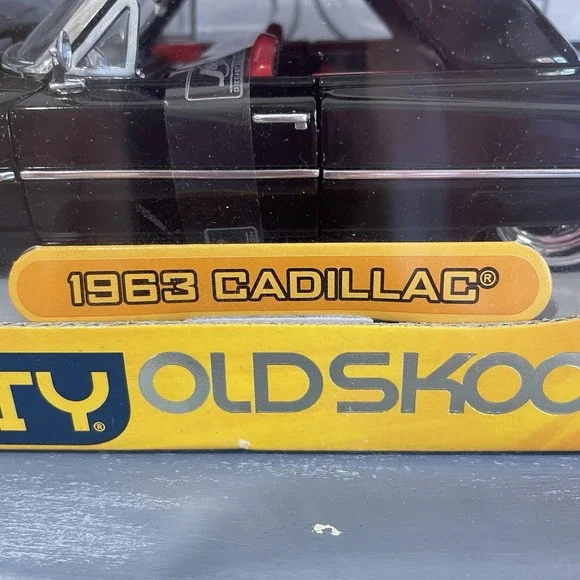 JADA DUB CITY OLDSKOOL 1963‎ Cadillac Black 1:24 DIECAST MODEL is